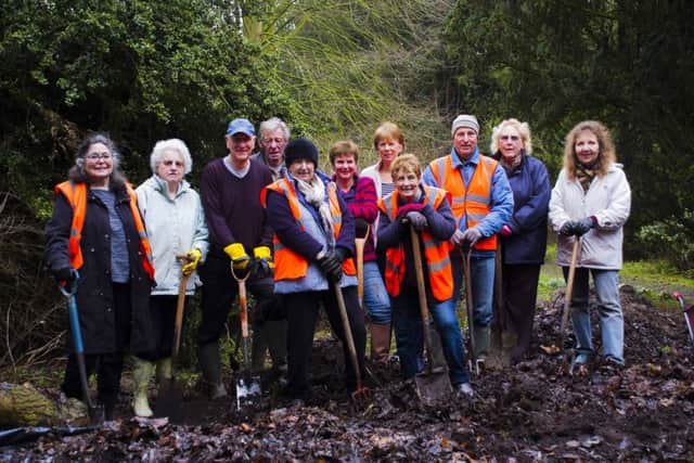 Volunteers help create a bog garden at Boston Cemetery. Photos supplied. EMN-180223-112307001