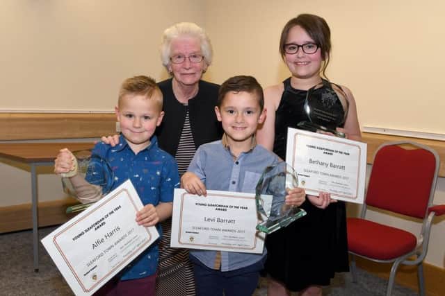 Young Sleafordian of the Year 2017 winners presented by Barbara Jones shared by Alfie Harris and brother and sister Levi and Bethany Barratt. EMN-180227-150459001