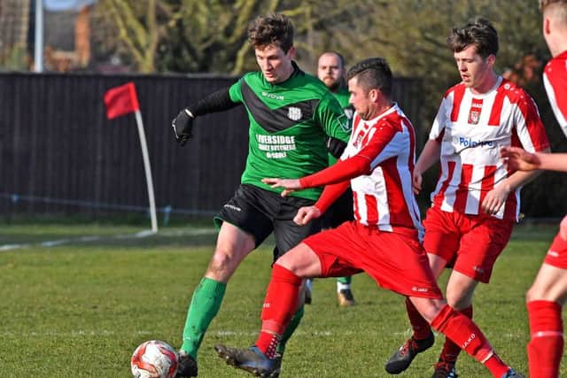 Scott Lowman in action during Saturday's victory over Brigg Town.