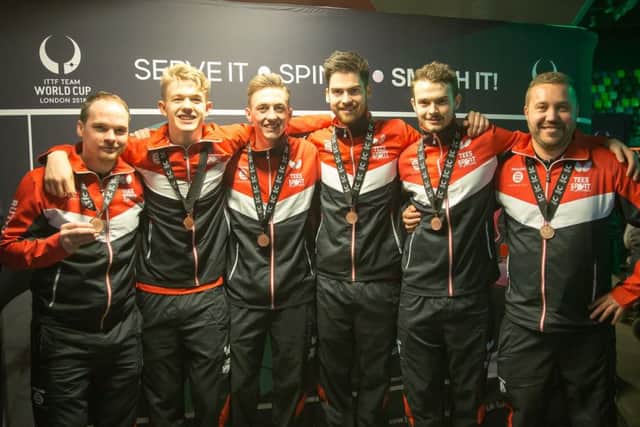 The England team with their medals.