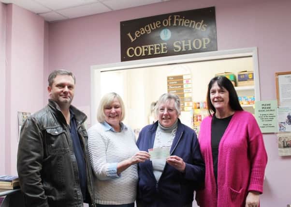 Jonathan Hinkins, Julia Gracie, Barbara Boobyer and Christine Raithby with the cheque.