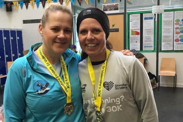 Andrea Mettam (left) and Zoe Parkes at the Valentines 30k EMN-180226-165246002