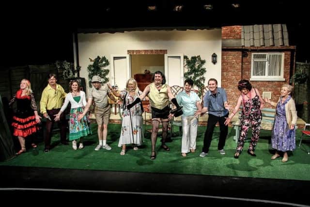 Boston Playgoers are celebrating 90 years. Here they are in Trivial Pursuits. EMN-180103-160750001
