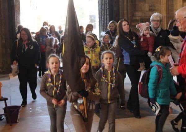Lincolnshire South Girl Guides taking part in Thinking Day at Lincoln Cathedral. EMN-180227-140412001