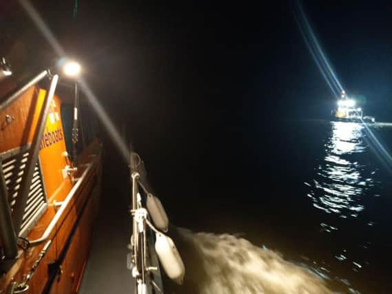 Skegness all-weather lifeboat on its way to rescue a fisherman who had broken his leg. ANL-180227-105418001