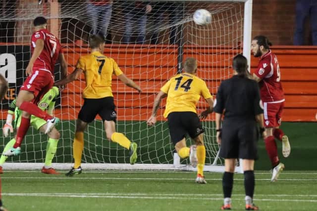Boston United in action on Tamworth's artificial surface.