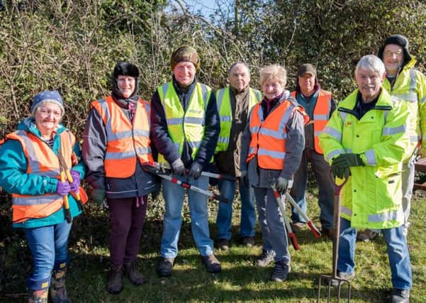 The volunteers who tidied up the entrance to Leasingham. EMN-180403-111554001