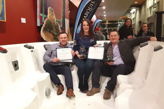 Pictured at the US awards, from left, area Gary Foster, sales manager, Melissa Brady, finance director, and Chris Brady, director.