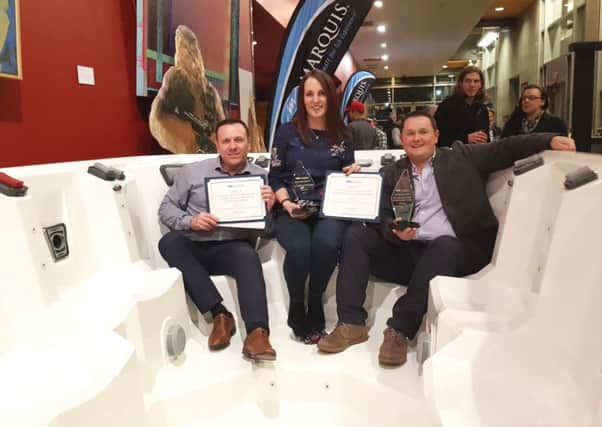 Pictured at the US awards, from left, area Gary Foster, sales manager, Melissa Brady, finance director, and Chris Brady, director.