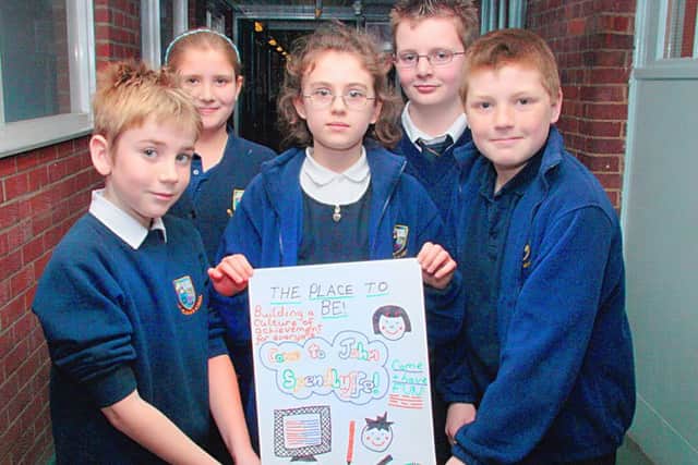 Pupils from St Helenas Primary School with their poster.