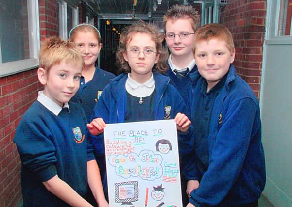 Pupils from St Helenas Primary School with their poster.