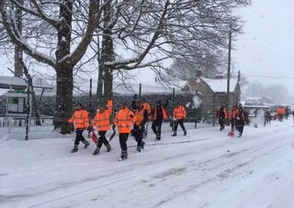 NKDC refuse collection teams head out from their Metheringham to clear snow outside residents' bungalows this morning (Wednesday). Photographed by a reader. EMN-180228-115846001