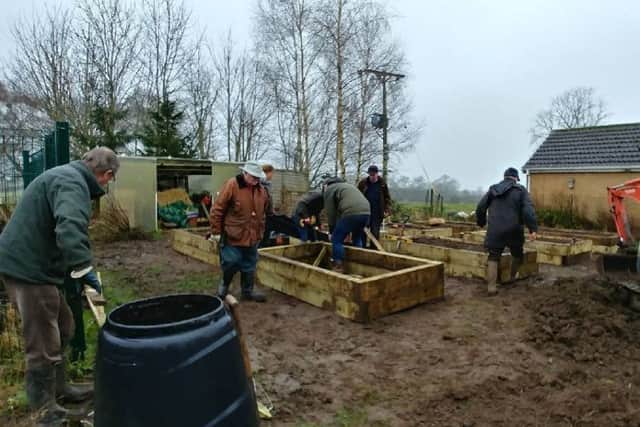Work got quickly underway, thanks to Michael Hansard, who loaned a mini digger, and the expertise of Pete Smith driving it, to reduce the amount of hand work necessary.