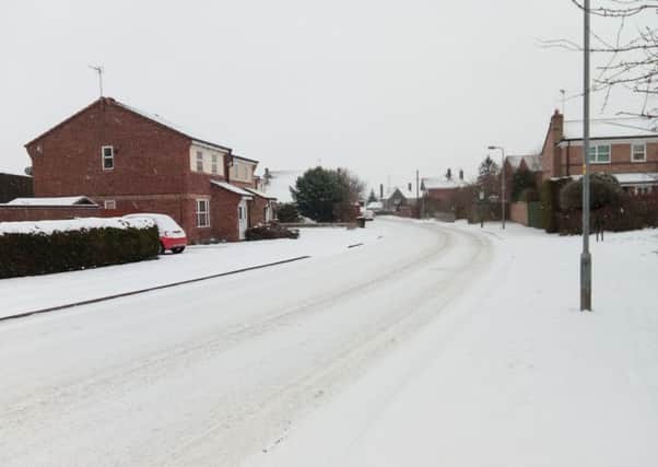 White out. Snow covered side roads affecting travel in Sleaford today (Thursday). Rookery Avenue pictured. EMN-180103-095813001