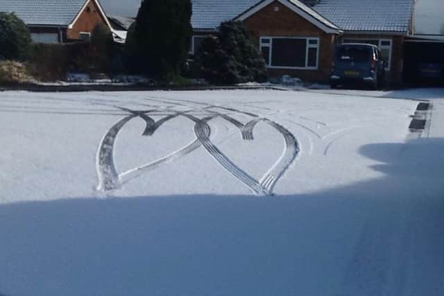 Gill Dwyer awaoke in Leasingham to find this romantic coincidence when neighbours maneouvred outside this morning (Thursday). EMN-180103-152802001