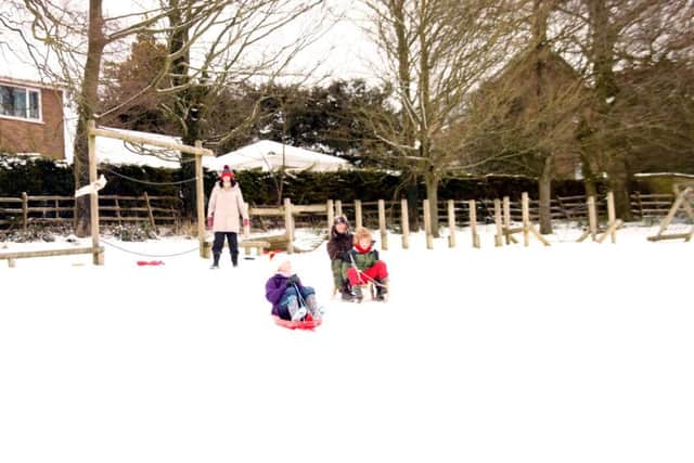 Sledging at Caistor's South Street Park EMN-180203-090810001