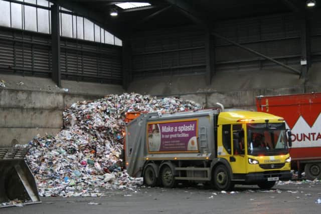 NKDC waste collection trucks dropping off loads of recycling at the transfer station in Sleaford.