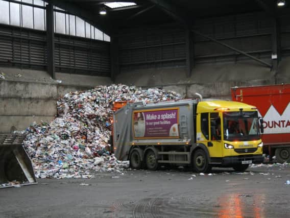 NKDC waste collection trucks dropping off loads of recycling at the transfer station in Sleaford.