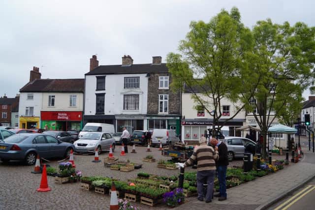 Council discuss being more aware of problem facing market traders in the town.