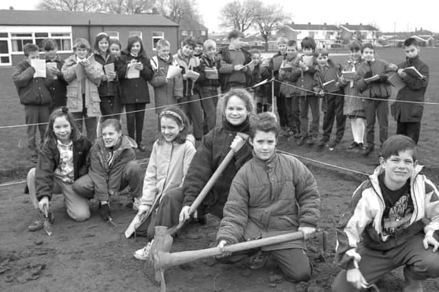 Youngsters are pictured at Staniland School in March 1993, helping excavate the site of a planned environmental nature area.