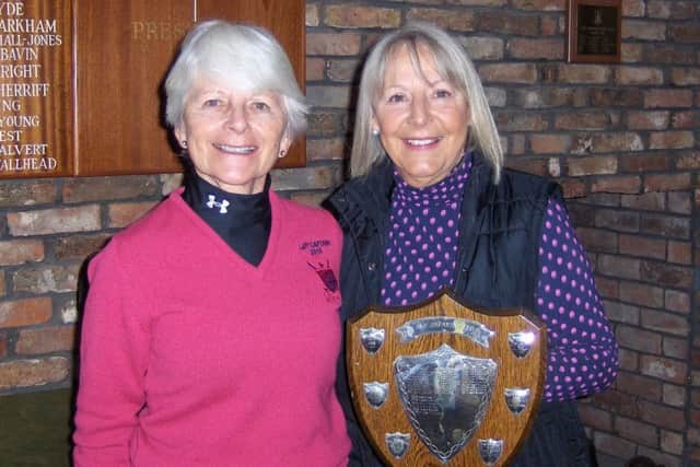 Lady Captain Janet Read (left) presents the Skene Shield to Anne Wallhead.