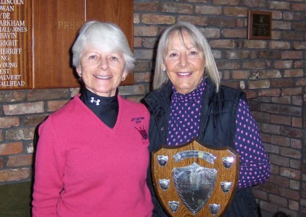 Lady Captain Janet Read (left) presents the Skene Shield to Anne Wallhead.