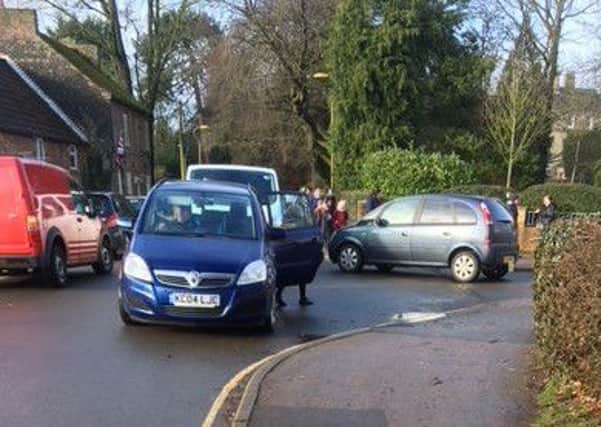 Cars blocking Bowl Alley Lane and the entrance to the primary school. Photo: Supplied.