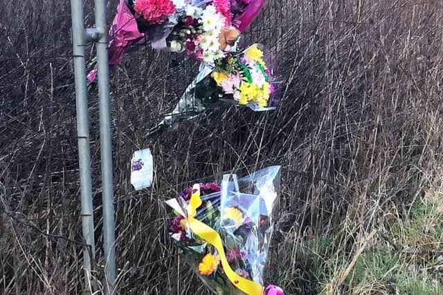 Flowers at the scene in Manby this afternoon (Thursday).