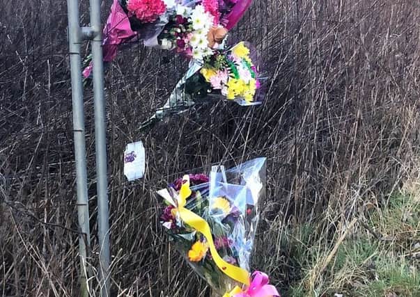 Flowers at the scene in Manby this afternoon (Thursday).