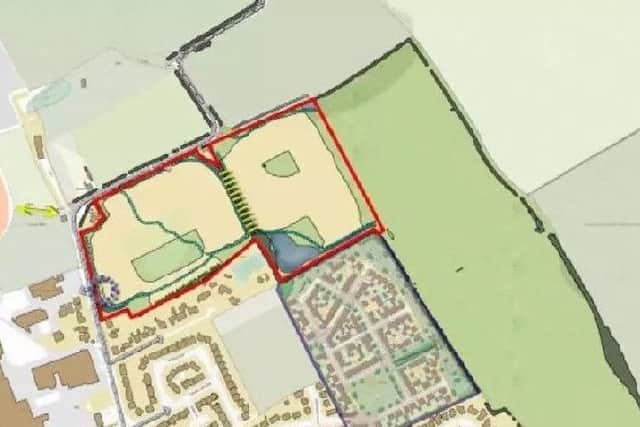 The area marked out in red is the site for the new homes.