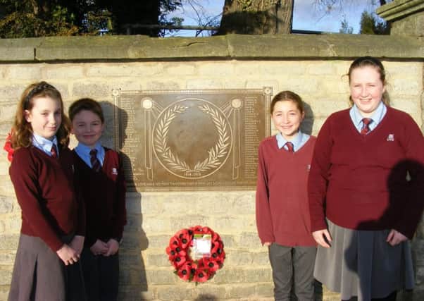 The plaque in memory of William Alvey School's 72 fallen war heroes. EMN-180803-173222001