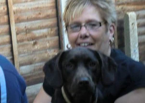 Shelly Wojcik with her dog Coco. ANL-180903-105459001