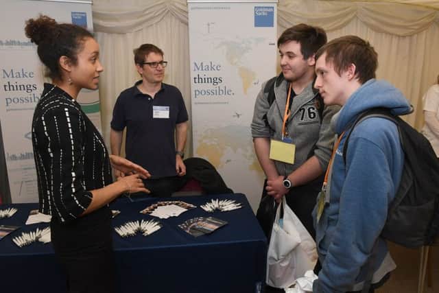 Careers' Day at Springfields Events and Conference Centre. L-R Naomi Evans and Adam Kolbert of Goldman Sachs, talking to Boston College students Kamil Kaminski 17 and Declan Charlton 17. EMN-180903-112538001