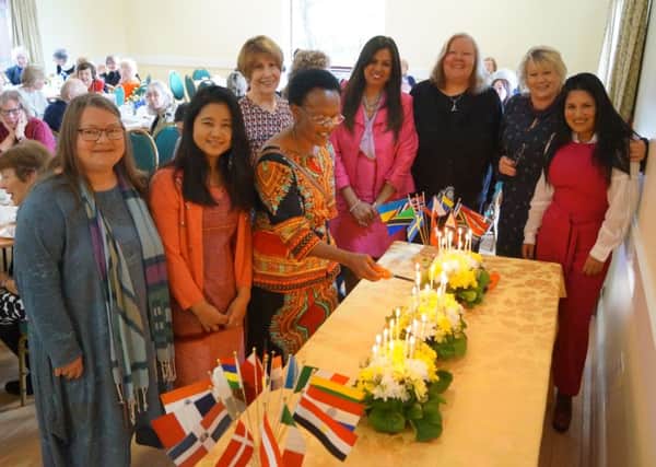 Members of HIWC lit a candle for each country represented - that's 32 in all. EMN-181203-064045001