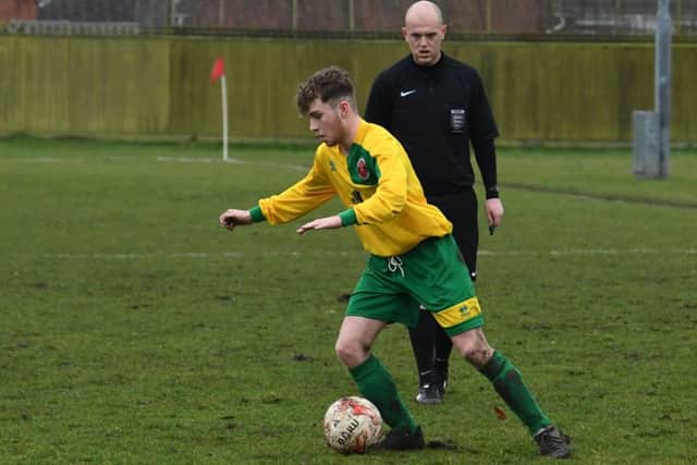 Horncastle (red) v Skegness (yellow). Jordon Potts (yellow).