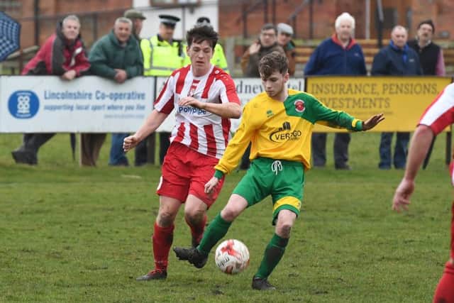 Horncastle (red) v Skegness (yellow). Andrew Bullivant (red), Jordon Potts (yellow).