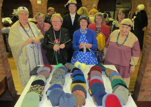 Coningsby & Tattershall WI members Margaret Burrell, Vera Hartley, Monica Barker, Janet Harrison, Liz Chapman, Anne Rutt, Marilyn Hawkins and Anne Bennett who have all contributed to the total number of hats sent to the Sailors Society.. EMN-180318-183138001