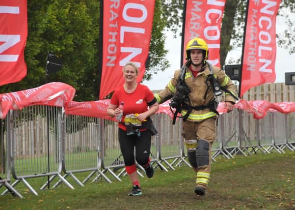 Firefighter Ash Smith will stand out among thousands of athletes at this year's Lincoln 10K as he will be running in full firefighters kit. EMN-181203-124808001