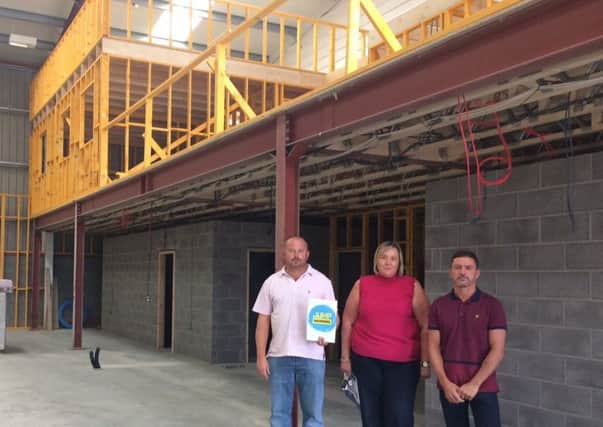 Jump Warriors backers Jonathan Graves and Nicholas Burton with Michelle Stott who will also be joining the team, pictured  at the previous location on the Wainfleet Road Industial Estate in Skegness. ANL-181203-161331001