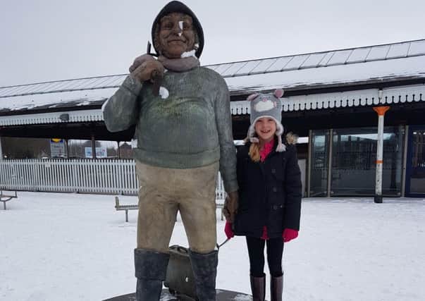 Joanne Perzhilla sent us this picture of Jasmine, aged 8,  with Jolly outside Skegness Railway Station. ANL-180203-123907001