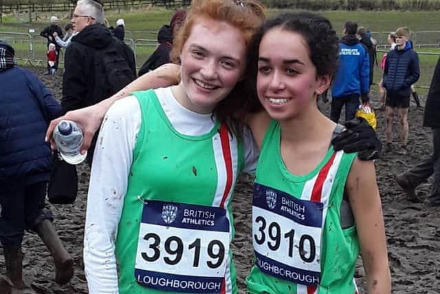 Hannah Reid and Issy Dhami are all smiles after their trial by mud EMN-181203-174527002