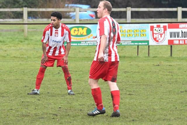 Richard Jackson, right, with teammate Nadir Boulaid.