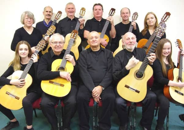 Members of The Solo Classical Guitar Ensemble of South Lincolnshire. EMN-180319-095621001
