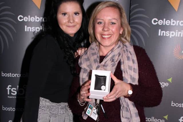 Sammy Jo Barlow celebrating receiving her Apprentice of the Year Award. ANL-180314-173001001