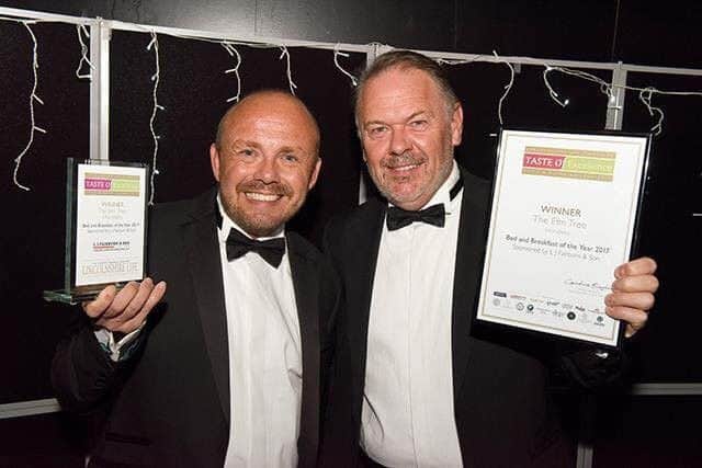 Jonathan and Chris Wilkinson-White with their Best Bed and Breakfast Tourism Excellence Award. ANL-180315-161440001