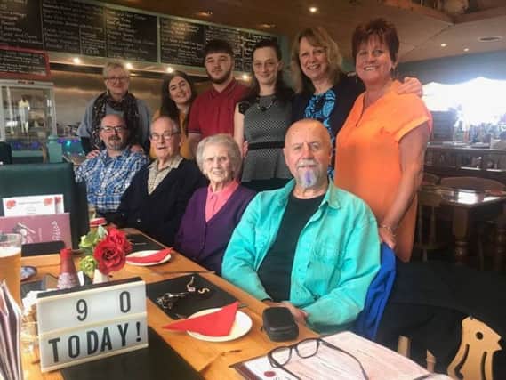 Kathleen Andrews with her family at her surprise birthday party at Poppy's Restaurant in Burgh Road, Burgh-le-Marsh. ANL-180315-171318001