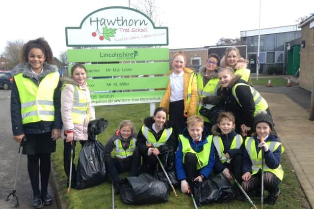 Litter pickers from Hawthorn Tree School.