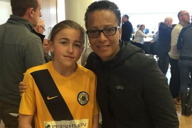 Ava Houlston with former England manager Hope Powell.