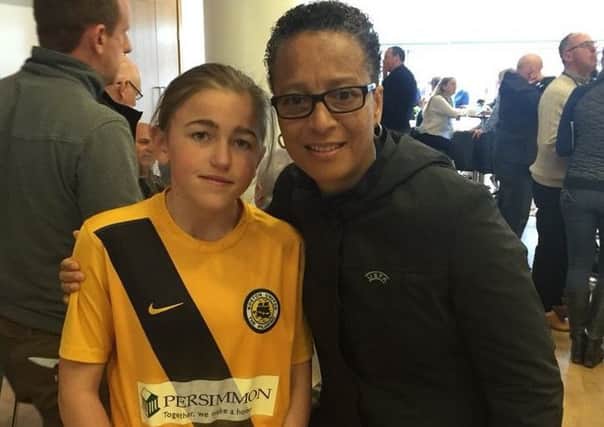 Ava Houlston with former England manager Hope Powell.