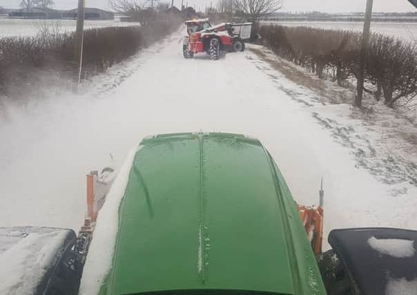 View from the tractor cab as farmers clear the roads around Leasingham earlier this morning. EMN-180318-121530001